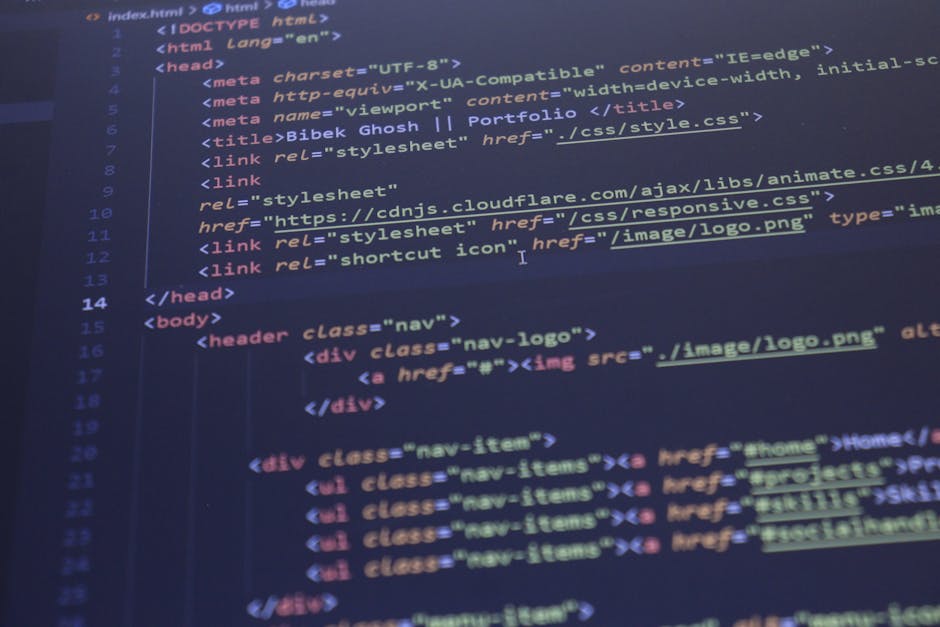A photograph of a computer screen displaying HTML code with syntax highlighting in blue, pink, and white colors. The code includes elements such as <doctype>, <html>, <head>, and <body>, with nested t
